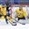 PLYMOUTH, MICHIGAN - APRIL 4: Sweden's Sarah Grahn #1 makes a glove save while Johanna Olofsson #7 battles with Finland's Linda Valamaki #10 during quarterfinal round action at the 2017 IIHF Ice Hockey Women's World Championship. (Photo by Matt Zambonin/HHOF-IIHF Images)

